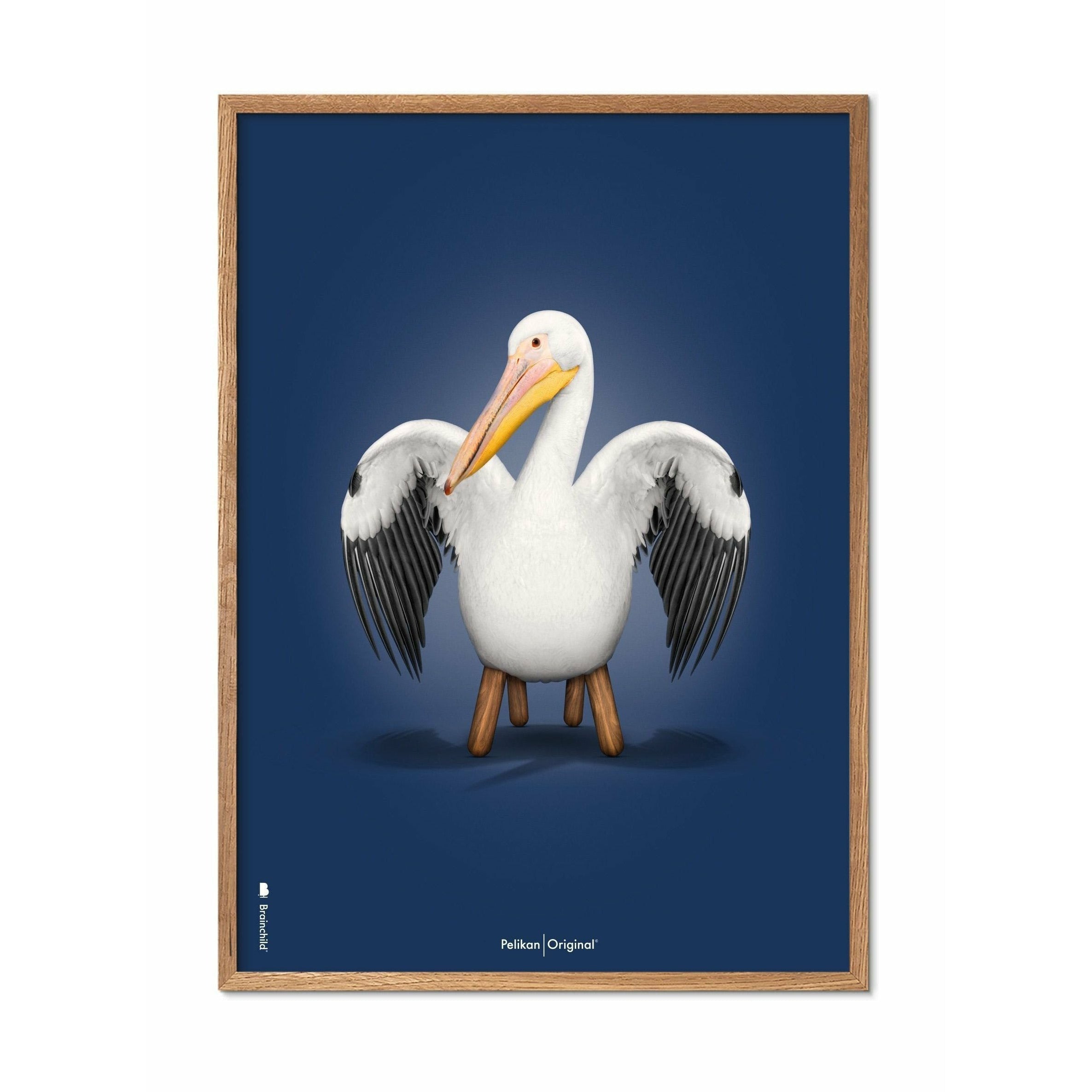 Brainchild Pelican Classic -affisch, ram i lätt trä 50x70 cm, mörkblå bakgrund