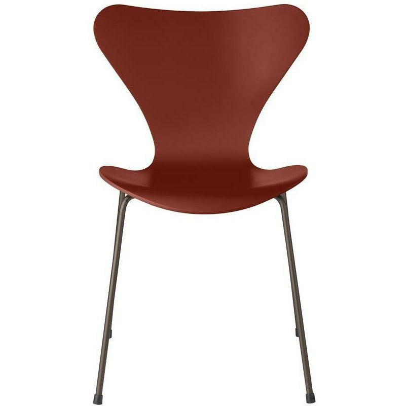 Fritz Hansen Serie 7 -stol lackerad venetiansk röd skald, brun brons ben